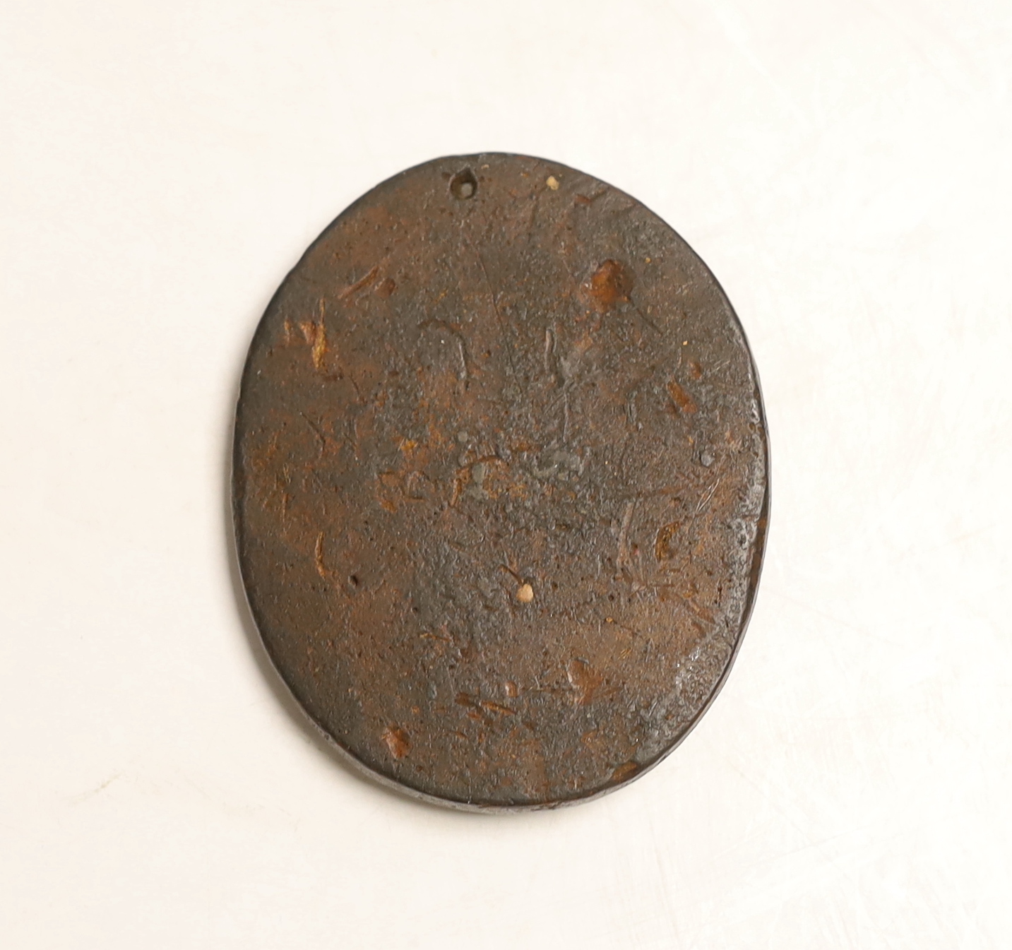 An 18th or 19th century composition oval portrait relief of a Wyvill baronet, 8 x 6.5cm